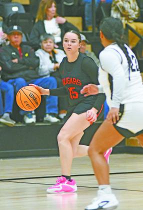 Morgan Campbell brings the ball up court for North Rock Creek during the finals of the Okemah Tournament Saturday evening. Photos courtesy of Brian Blansett, Lincoln County News