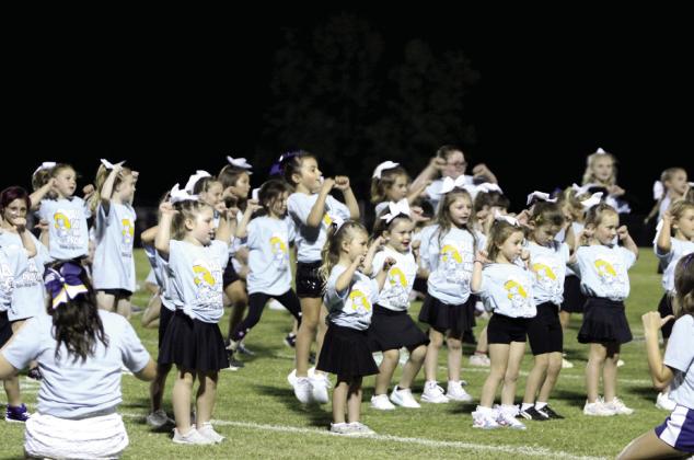 Elementary-age participants in the annual spirit clinic perform during halftime of the Bethel home football game on Sept. 26, led by the high school cheerleaders. Natasha Dunagan, Countywide &amp;amp; Sun