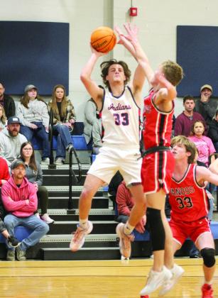 Asher’s Jordyn Litson sinks his jump shot in the first quarter of the Jan. 12 home game with Vanoss. The Indians won, 55-44. Countywide &amp; Sun/Natasha Dunagan