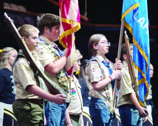 Members of Scout Troops #417 and # 477 Color Guard present the colors during the opening ceremony. Photo by Jesse Monday Media