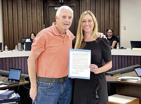 Former Mayor Ed Bolt (left) and Ward 2 Commissioner Cami Engles are presented with Resolutions of Appreciation for the service to Shawnee. There are now four new members on the seven seat Shawnee Board of City Commissioners. Photo provided by the City of Shawnee