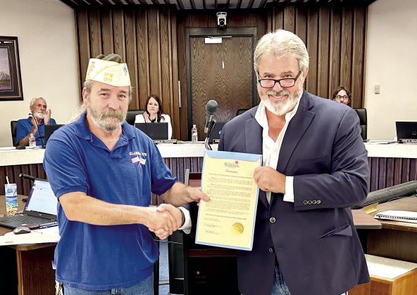 Proclamations for Patriot Day and National Day of Service and Remembrance (Sept. 11, 2024) and National POW/MIA Recognition Day (Sept. 20, 2024) were presented by Mayor Eric Stephens were accepted by Senior Vice Commander of the VFW, Post 1317, and Marine Corps retiree, Don Plumley. Photo provided by City of Shawnee