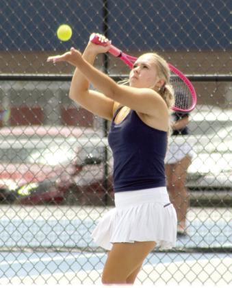 Shawnee junior Masei Hope serves during the Suburban Conference Tournament on April 13 at Shawnee High School. Hope is on the #2 Doubles team with Gracealan Ortega, also a junior, and they placed third.