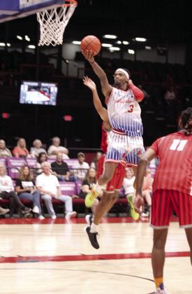 Potawatomi Fire Forward Ricky Artis II goes to the basket on June 5, in the first game of the Midwest Conference Finals against the Logansport Iron Horses at FireLake Arena. Artis made 11 points and two rebounds during that game, according to potawatomifire.com. The Fire won that game, 160-90, and the second game on June 7, 134-109, to take the trophy. They will move on to the Western Regional Finals against Great Falls Electric, June 12 (away) and June 15 (FireLake Arena). Natasha Dunagan, Countywide &amp; Sun