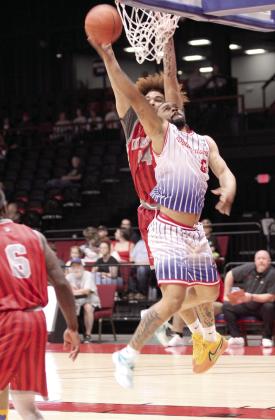 Potawatomi Fire Guard Deshawn Munson sinks a bucket on June 5, in the first game of the Midwest Conference Finals against the Logansport Iron Horses at FireLake Arena. Munson made 20 points, nine rebounds, four assists and one steal during that game, according to potawatomifire.com. Natasha Dunagan, Countywide &amp; Sun
