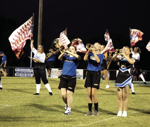 The Pride of Bethel Marching Band and Color Guard perform to their basebal-themed show, 'Bottom of the Ninth,' during the first game of the season, against Little Axe on Aug. 28.