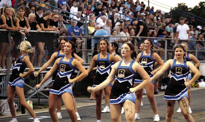 The Bethel High School Cheerleaders perform during the first game of the season, against Little Axe on Aug. 28. The theme for the night was 'Back in Black,' so the student section wore all black.