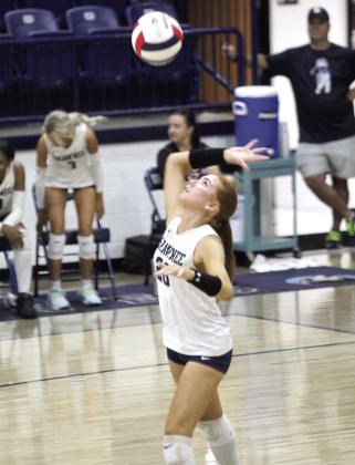Shawnee sophomore Kenda Whittington focuses on her serve during the Aug. 27 home meet.