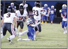 gaining yardage in the Class 2A District home game on Sept. 22. Lynch finally finds a teammate