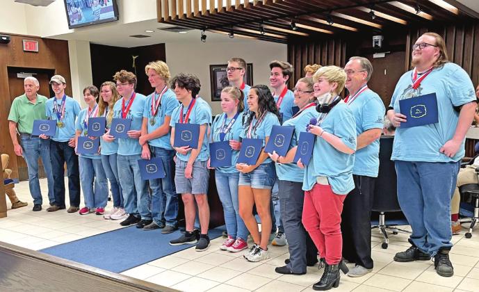 Gordon Cooper Technology Center Robotics Team, Sprockets FIRST Team #2341, is presented with a certificate of recognition during the Shawnee City Commission meeting Monday, May 16. The team won the Engineering Inspiration Award at the 2022 FIRST Championship in Houston. Countywide &amp;amp; Sun/Loren Knight