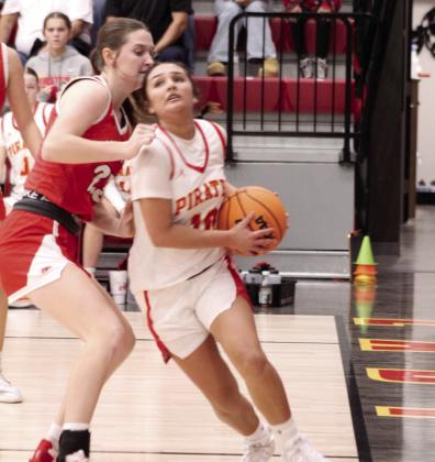 Dale freshman Addison Hill makes her way to the basket during the game against Washington.