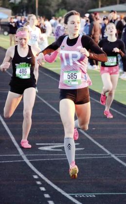 Baylee Tapley of Bethel runs in the 800-meter event for the Thunder Road Running Club during the Texas Distance Festival at Southlake, TX in March 2023. Tapley recently won first in the 3,200-meter race at the Track and Field State Championships. Photo provided