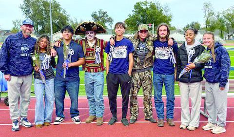 SHS Cross Country seniors pictured with Coach Bobby Licklider and Coach Jaylin Stapleton Photo Provided
