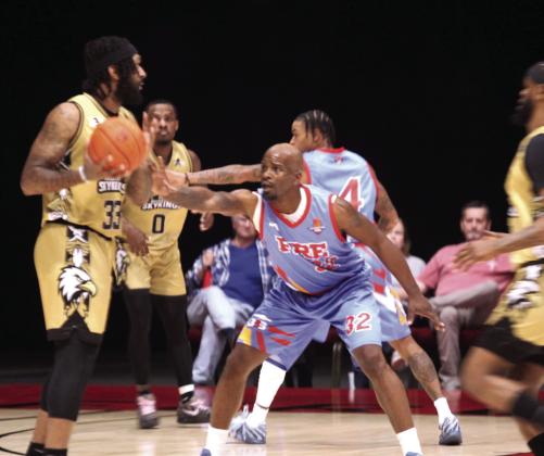 Potawatomi Fire Guard Willie Warren reaches for the ball on defense in the first quarter of the March 14 home game against the SkyKings.