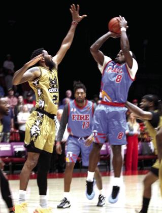 Potawatomi Fire Forward K.D. Moore launches a shot in the first quarter.