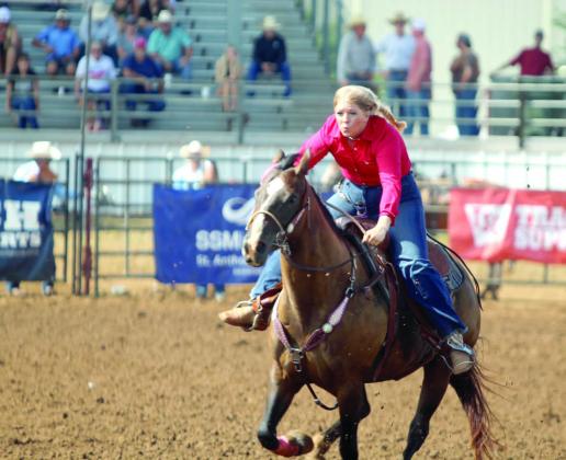 Josey Milburn of Asher sprints to the third barrel during the IFYR on the morning of July 16.