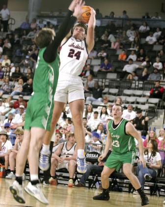 Asher's Greyson Wood launches a jumper and sinks it in the third quarter of the Class B2 State Quarterfinal game against Leedey on March 3 at the OG&amp;E Coliseum in OKC.