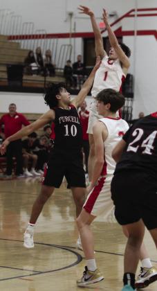 McLoud senior Mason Craven tries for a three-pointer in the last two seconds of play during the regional game against Purcell. Natasha Dunagan, Countywide &amp;amp; Sun
