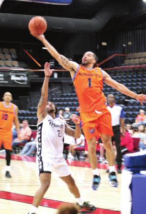 Potawatomi Fire Point Guard Tevin Foster goes to the hoop for two points during the second First-Round Playoff game against the Rockwall 7ers on June 4.