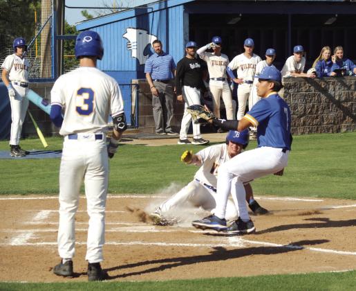 Bethel senior Gavin Lynch slides to steal home, as sophomore Zeric Beasley waits to bat, during the April 20 home game against Holdenville. Natasha Dunagan, Countywide &amp; Sun