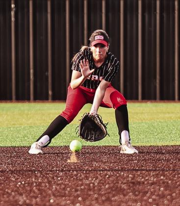 NRC's Izzy O'Daniel fields the line drive to her on April 16. North Rock Creek won both games played: Perkins, 8-0, and Norman, 14-4. Photo Courtesy of Gowin Photography