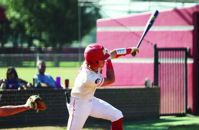 Dale sophomore Cruz Garrett smacks a single in the first inning of the Dale Baseball Invitational Championship game with Okarche on Aug. 16.