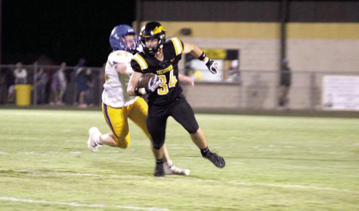 Tecumseh freshman Braylon Nease runs the ball past the defense. Natasha Dunagan, Countywide &amp;amp; Sun