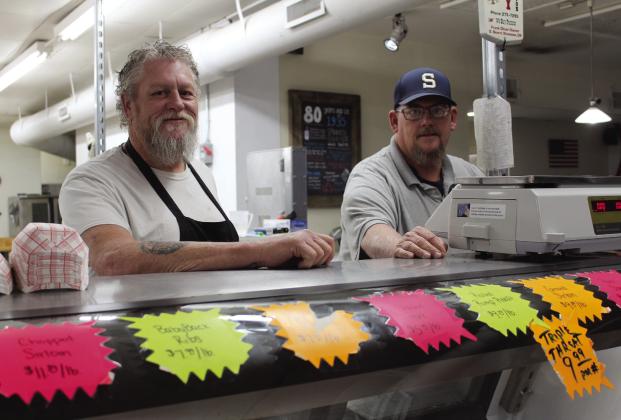 Brothers Grady and Scott Oliver stand ready for customers at the counter of Hardesty Market &amp; Deli, which has been located at 613 N. Pottenger in Shawnee for two years now. The past year held health challenges and the destruction of their former historic location at the corner of Gordon Cooper Drive and Hardesty Road, but their business has been "twice as busy" as before the move, and they have continued to share their success with several non-profit organizations. Countywide &amp; Sun/Natasha Dunagan