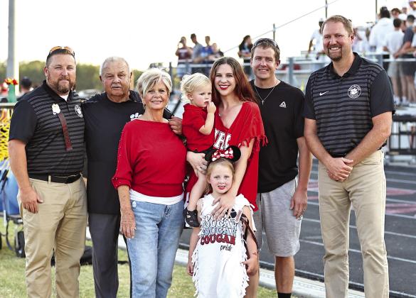 North Rock Creek celebrate Coach Gary Higgins being one of the 2024 Oklahoma Coaches Hall of Fame inductees. The ceremony was held during the annual OCA Coaches Clinic and All State week in July. Pictured from left are NRC Athletic Director Evan Smith; Higgins; wife, Sherry; Ezra, Sophia, Jessica and Eric Slaughter; and, NRC Superintendent Blake Moody. Photo courtesy of Gowin Photography.
