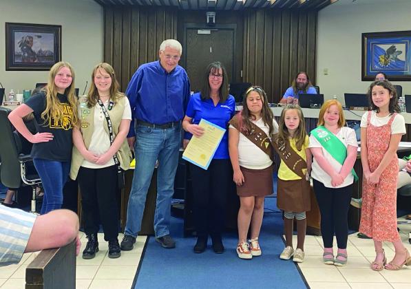 Girl Scout members were present at the Shawnee City Commission meeting Monday, Apr. 10 and were presented with the Arbor Day Proclamation presented by Shawnee Mayor Ed Bolt. Bolt said the troop was helpful in planting trees recently distributed in Shawnee. Pictured from left are Elana McPherson, Olivia Hill, Mayor Bolt, Leader Sue Ellen Frerichs, Harley Messinger, Reagan Yahola, Violet Mosier, and Ember McPherson. Countywide &amp;amp; Sun/Suzie Campbell