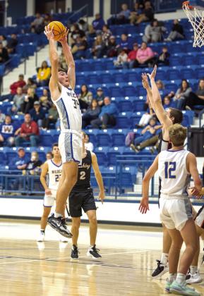 Bethel's Bronc Robbins aims for the hoop during the Route 66 Basketball Tournament in Stroud on Jan. 5, against Cushing. The Wildcats lost that game, 59-66, won against Stroud, 54-31, and lost to Seminole, 64-67. Photo provided by Richelle Treece.