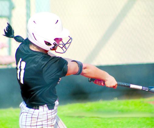 Tecumseh junior Vivian Hayes hits a single in the second inning of the home game with Perkins-Tryon, Aug. 7. Tecumseh won their first game of the fastpitch season, 15-1.