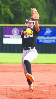 Tecumseh senior Serenity Jacoway resumes her role as fastpitch softball pitcher and aims the ball over home plate in the first home game, with Perkins-Tryon on Aug. 7. Jacoway has pitched all four years of high school.