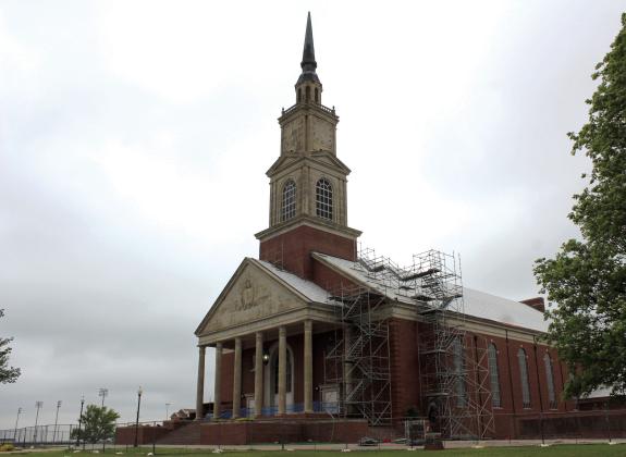 Raley’s Chapel still has scaffolding and is fenced off for repairs almost a year after the tornado went through Shawnee. Countywide &amp; Sun/Natasha Dunagan