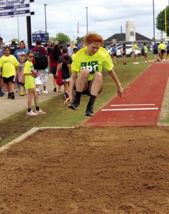 South Rock Creek sixth-grader Sarah Davis competes in the long jump.