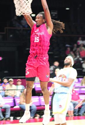 Potawatomi Fire Forward Jay Hedgeman makes a slam dunk. Natasha Dunagan, Countywide &amp;amp; Sun