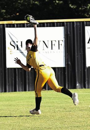 Tecumseh’s Aleigha McCullough makes a great catch for the out. However, THS lost 2-1 to North Rock Creek in the game Monday, Sept. 16. Photo courtesy of Gowin Photography