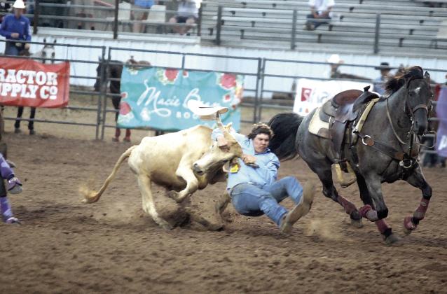 Dally Trussell of McLoud brought his steer down in 6.6 seconds during the IFYR championship round on the evening of July 17. Trussell took seventh place in the event. See photos on pages A6 and A7. Natasha Dunagan, Countywide &amp;amp; Sun