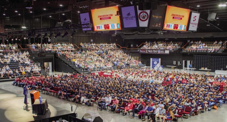 Jon Gordon addresses an audience of nearly 2,000 local educators at the “Celebrate Teachers” event on Monday, Aug. 7. Photo courtesy of Jesse Monday Media