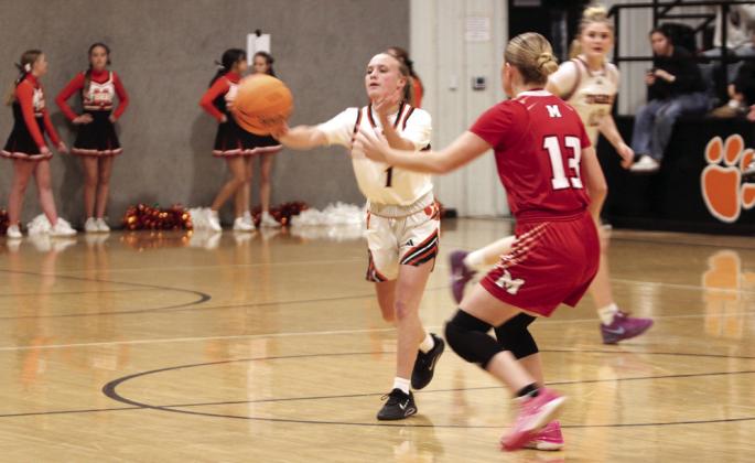 Maud freshman Payton Collins passes to a teammate. Maud hosted seven other teams for the three-day tournament.