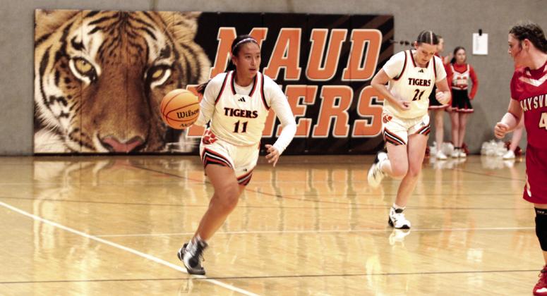 Maud senior Abi Horton takes the ball upcourt in the Dec. 4 game against Maysville. The Lady Tigers lost to Maysville, 20-56; beat Life Christian Academy, 62-24; and, fell to Wetumka, 23-53.