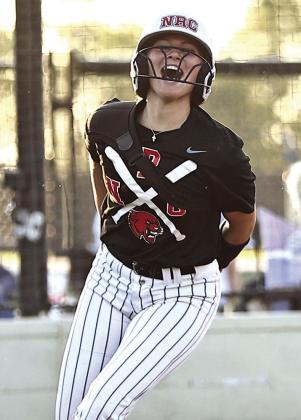 NRC's Aubree Shivelhood is all smiles after scoring the winning run. Photo Courtesy of Gowin Photography