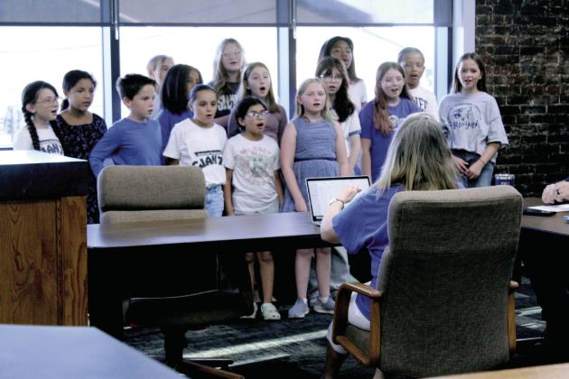 Members of the Fifth-grade Choir from Sequoyah Elementary School perform a song about colors in Spanish at the Shawnee Public Schools Board of Education meeting on Oct. 6. Natasha Dunagan, Countywide &amp;amp; Sun