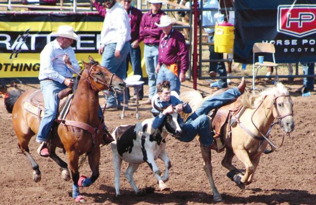 Nathan Duvall, of Henryetta, competes in the Steer Wrestling event during the IFYR on July 12 at the Heart of Oklahoma Expo Center. The IFYR marks its 30th year with 965 entries from 32 states.