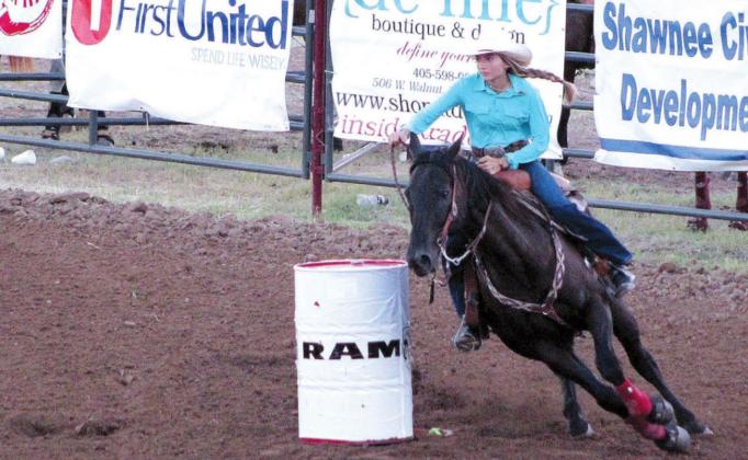 Kaylin McRae, of Meeker, competes in the Barrel Racing event during the IFYR on July 11 at the Heart of Oklahoma Expo Center. The IFYR marks its 30th year with 965 entries from 32 states.