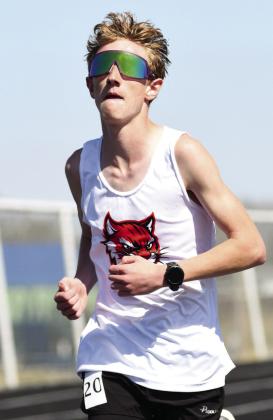 (right) EHS's Konnor Arington placed 5th in the 3200 meter run with a time of 1:11.72 in the Stroud track meet on Mar. 28.