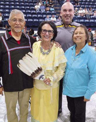 Tecumseh Indian Education Director Victor Cope, Tecumseh Superintendent Robert Kinsey and Jerri Jones pose with Citizen Potawatomi Nation Vice Chairman Linda Capps. Capps is retiring from CPN after more than 36 years, and was the Special Honoree. Photo provided by Victor Cope