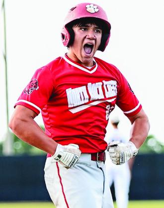 Traceton Childress gets pumped after hitting a triple.