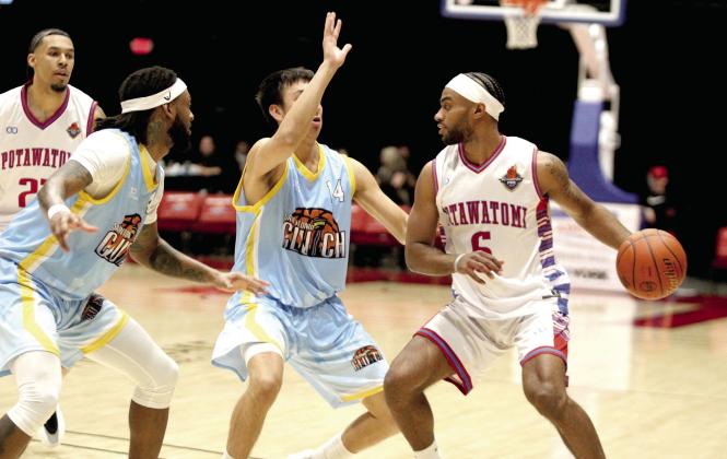 Potawatomi Fire Guard Jaylen Mahone looks for an opening to pass to Forward Isaiah Wade during the fourth quarter of the March 23 home game with the San Antonio Clutch. Natasha Dunagan, Countywide &amp; Sun