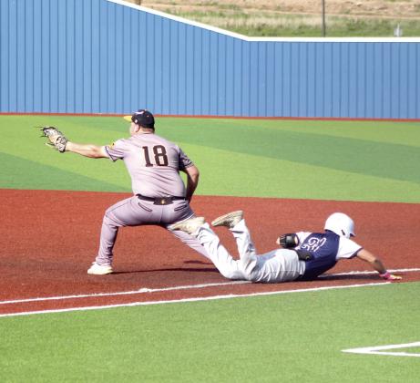 Asher junior Beau Willis dives across first base after hitting a single during the Class B Baseball Regional game against Boswell. Natasha Dunagan, Countywide &amp;amp; Sun